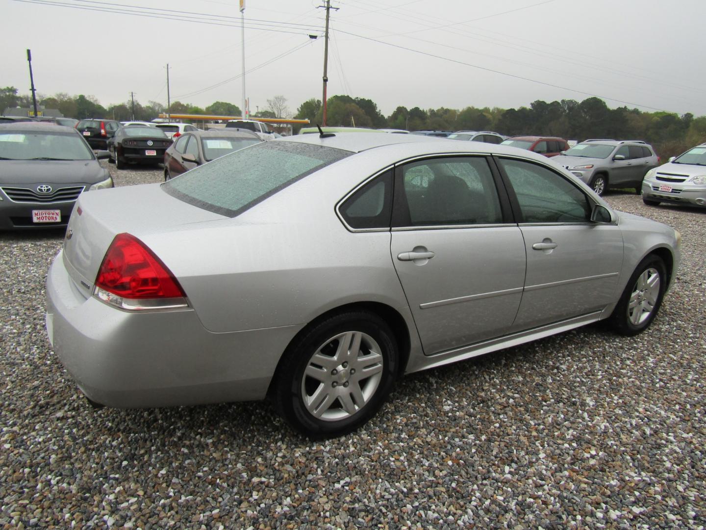 2014 Silver Chevrolet Impala LT (2G1WB5E30E1) with an 3.6L V6 DOHC 16V FFV engine, Automatic transmission, located at 15016 S Hwy 231, Midland City, AL, 36350, (334) 983-3001, 31.306210, -85.495277 - Photo#7